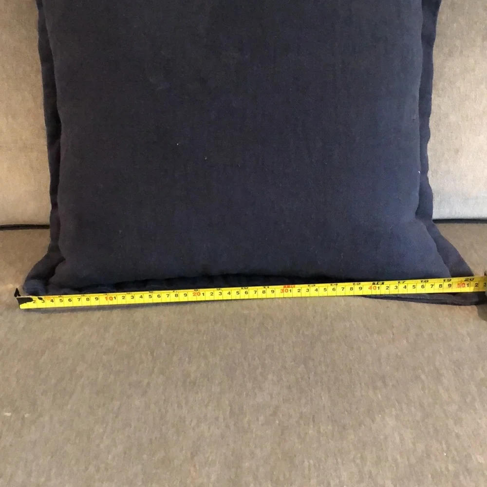 Navy down filled pillow with down insert. Approximately 20 x 20 edge to edge